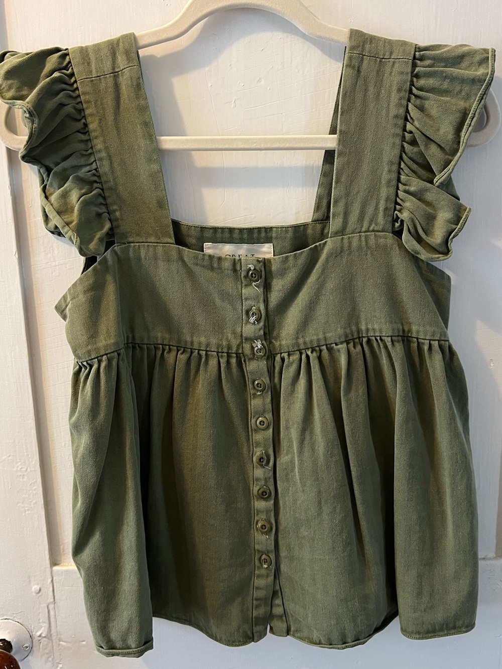The Great. Cropped peplum button top